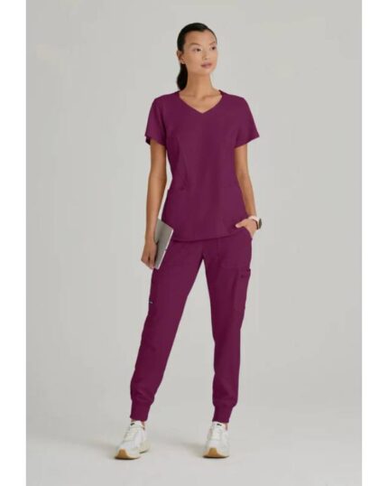 Blusa médica con escote en V curvo y tres bolsillos Carly Anatomía de Grey™ de Barco Spandex Stretch