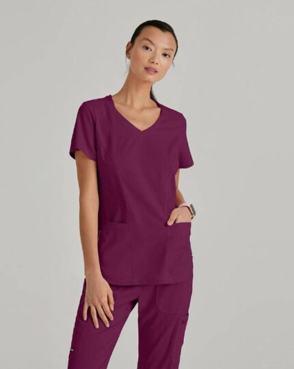 Blusa médica con escote en V curvo y tres bolsillos Carly Anatomía de Grey™ de Barco Spandex Stretch