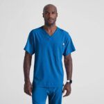 Blusa médica con cuello en V y un bolsillo Skechers™ de Barco