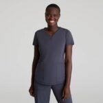 Top Serene con escote en V y tres bolsillos Zapatillas sin cordones Skechers™ de Barco